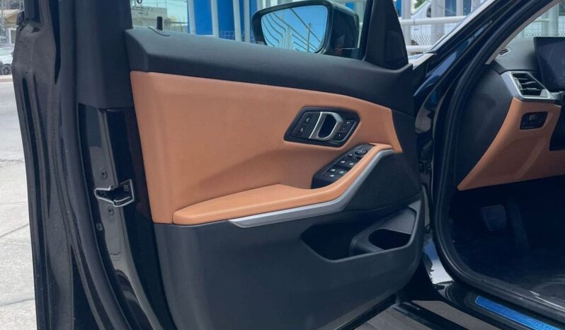BMW 320i 2023 lleno