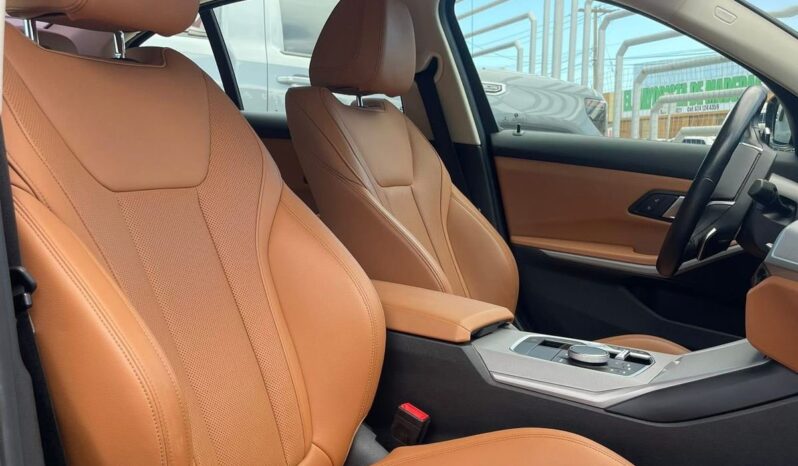 BMW 320i 2023 lleno