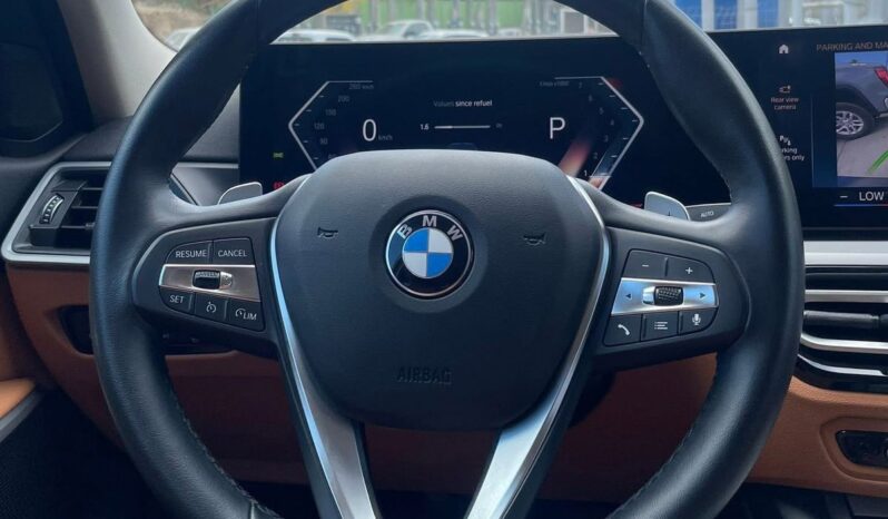 BMW 320i 2023 lleno