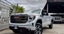 GMC SIERRA GRIS DOBLE