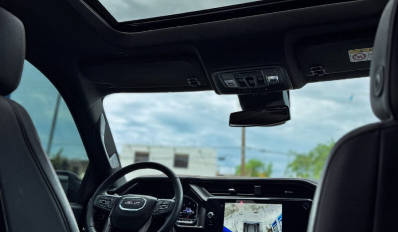 GMC SIERRA GRIS DOBLE lleno