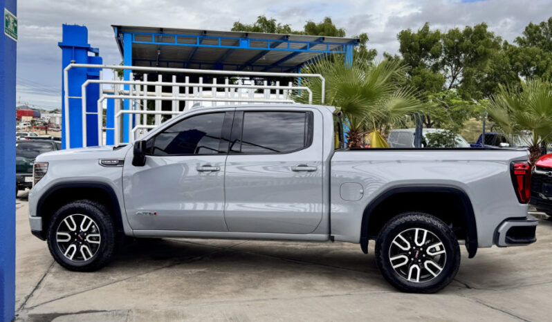 GMC SIERRA GRIS DOBLE lleno