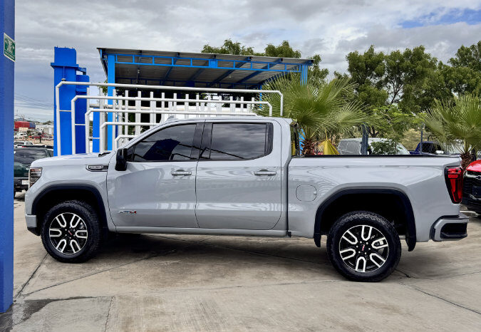 GMC SIERRA GRIS DOBLE lleno