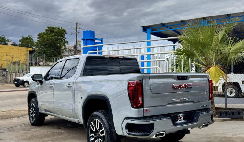GMC SIERRA GRIS DOBLE lleno