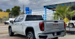 GMC SIERRA GRIS DOBLE