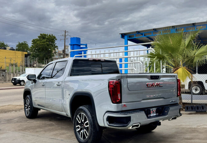 GMC SIERRA GRIS DOBLE lleno