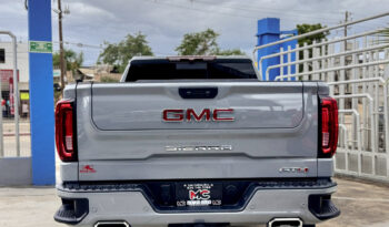 GMC SIERRA GRIS DOBLE lleno
