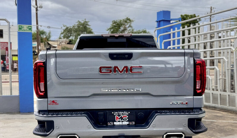 GMC SIERRA GRIS DOBLE lleno