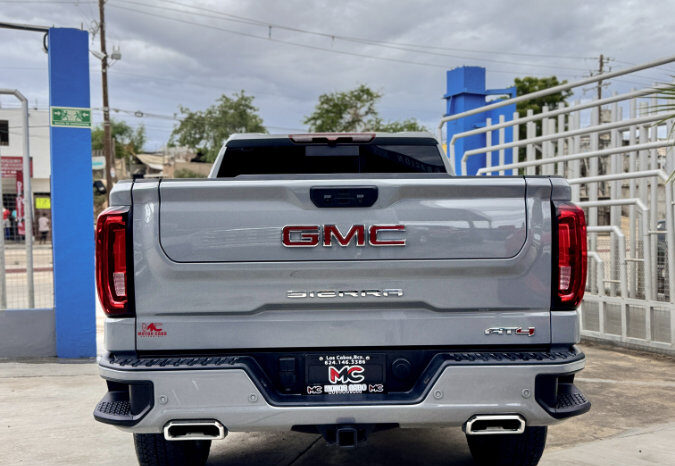 GMC SIERRA GRIS DOBLE lleno