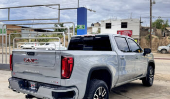 GMC SIERRA GRIS DOBLE lleno