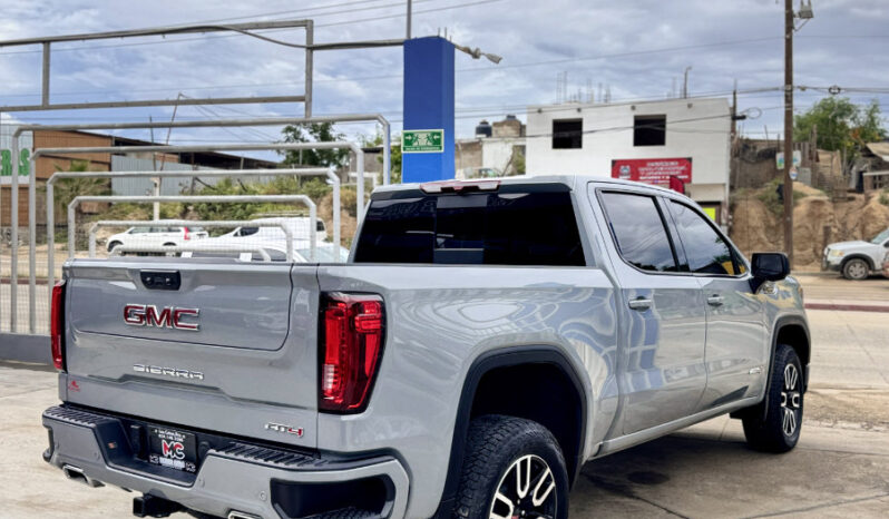 GMC SIERRA GRIS DOBLE lleno