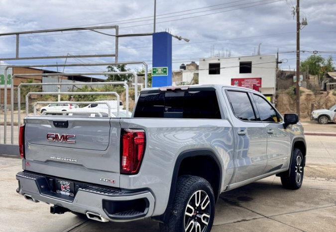 GMC SIERRA GRIS DOBLE lleno