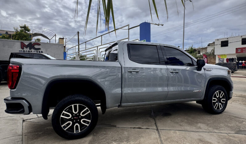 GMC SIERRA GRIS DOBLE lleno