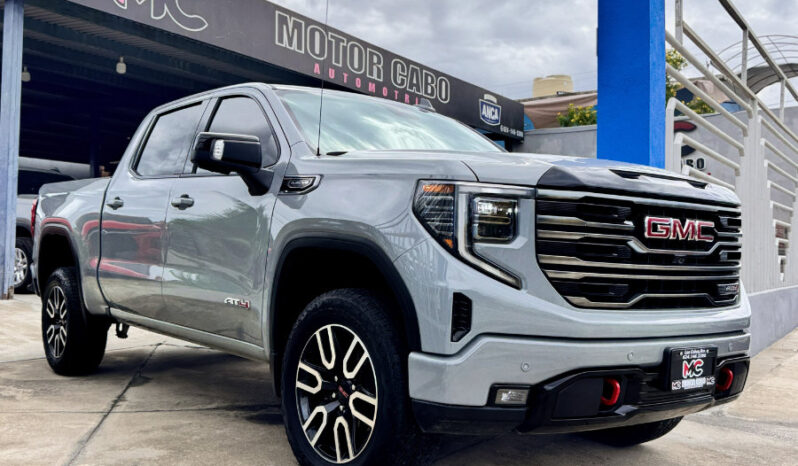 GMC SIERRA GRIS DOBLE lleno