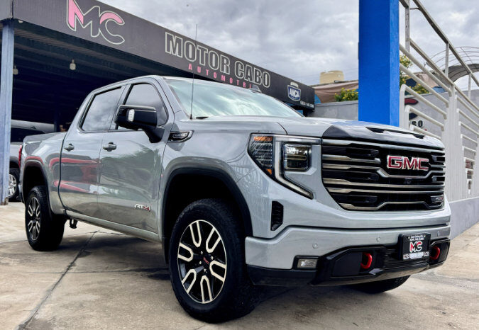 GMC SIERRA GRIS DOBLE lleno