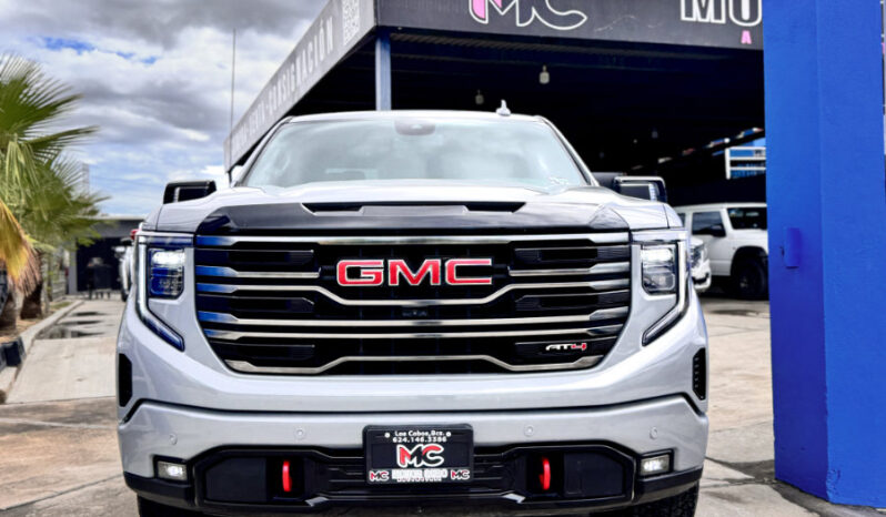GMC SIERRA GRIS DOBLE lleno