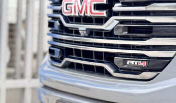 GMC SIERRA GRIS DOBLE lleno