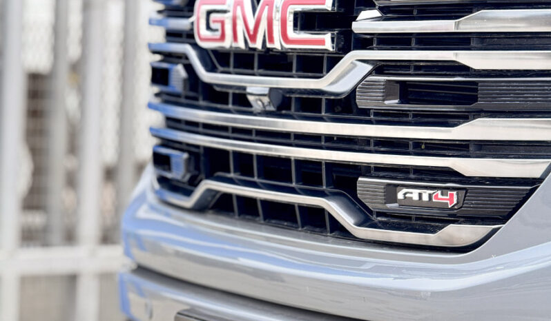 GMC SIERRA GRIS DOBLE lleno